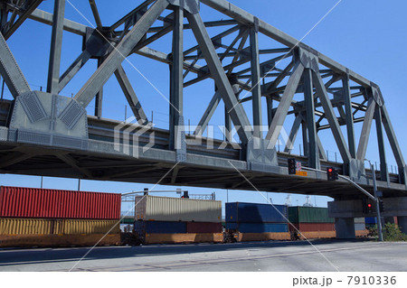 Bridge and cargo containers at the Port of Los Angeles, California, USA 7910336