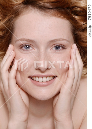 Young woman with curly red hair, portrait Young woman with curly red hair, portrait 7910479