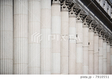 Columns of ornate building 7910551