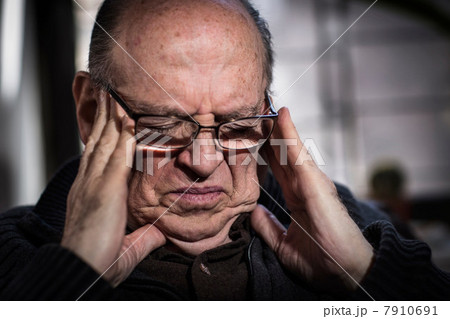 Senior man with eyes closed, wearing glasses, looking stressed Senior man with eyes closed, wearing glasses, looking stressed 7910691