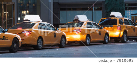 Panoramic of yellow taxis in a row, New York City, USA Panoramic of yellow taxis in a row, New York City, USA 7910695