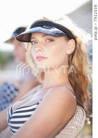 Woman sunbathing outdoors Woman sunbathing outdoors 7911038