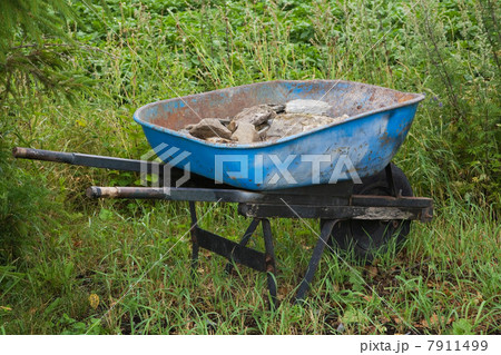 Wheelbarrow with rocks 7911499