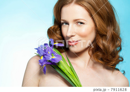Woman with purple flowers Woman with purple flowers 7911628
