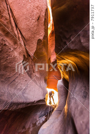Climber canyoning in Neon Canyon 7911737