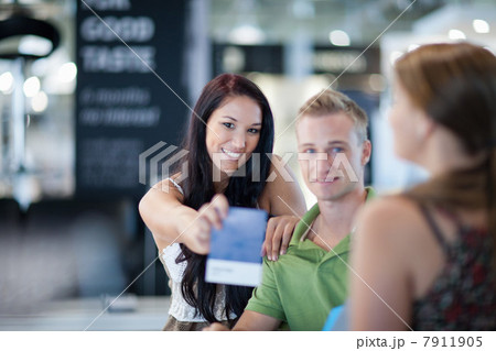 Woman holding fabric swatch in store 7911905