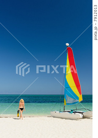 Woman on beach, Grace Bay, Providenciales, Turks and Caicos, Caribbean 7912013