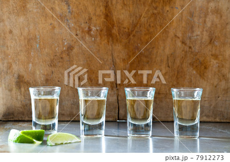 Row of tequila shots 7912273
