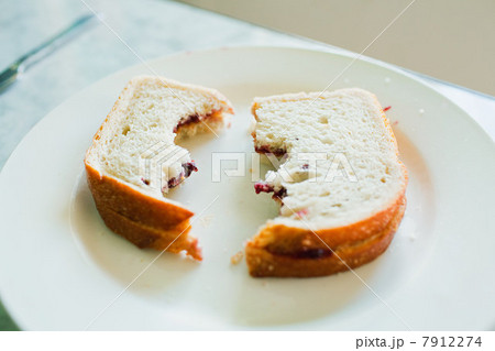 Half eaten sandwich 7912274