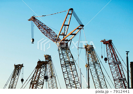 Group of construction cranes Group of construction cranes 7912441