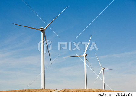 Three wind turbines side by side Three wind turbines side by side 7912535