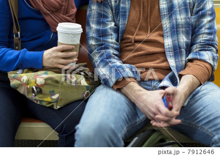 Couple sitting on urban subway 7912646