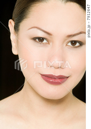 Young woman's face 7912647