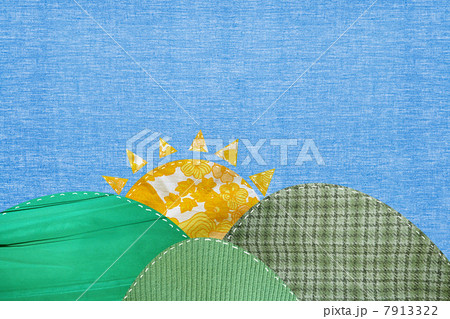 Rural scene with patchwork field and sun 7913322