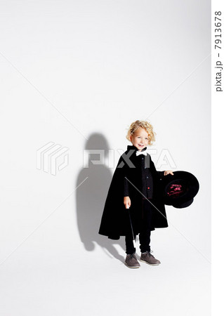 Boy wearing magician costume Boy wearing magician costume 7913678