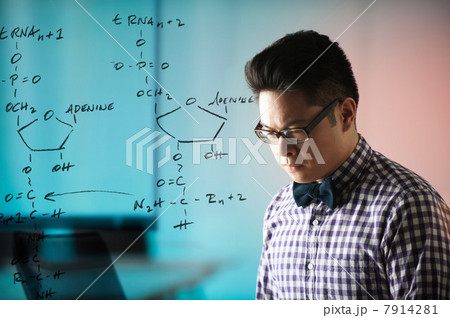 Young man with diagram on window 7914281