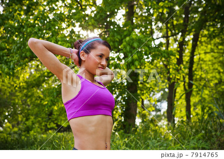 Young woman stretching 7914765