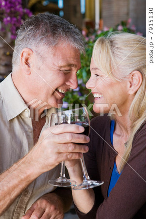 Mature couple having wine 7915130