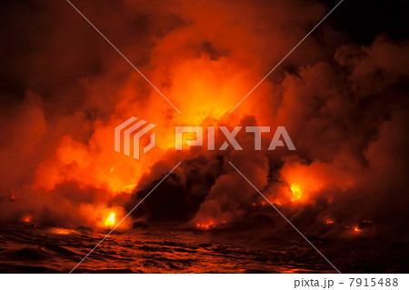 Smoke clouds from lava flow impacting sea at night, Kilauea volcano, Hawaii 7915488