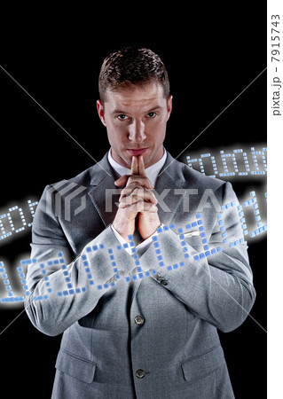 Businessman surrounded by ring of binary code 7915743