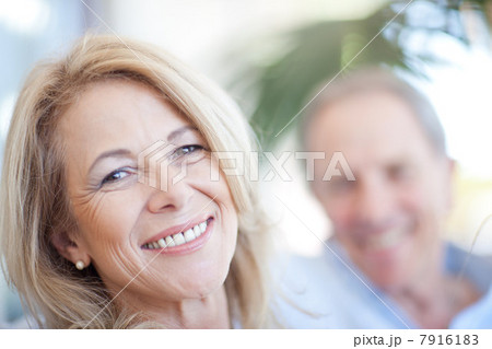 Close up of older woman's smiling face Close up of older woman's smiling face 7916183