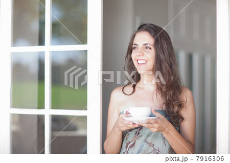 Young women with cup of tea 7916306