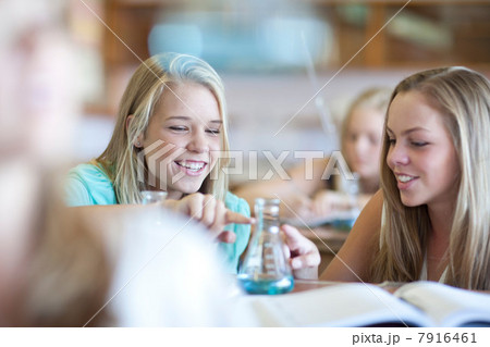 School girls enjoying science lesson 7916461