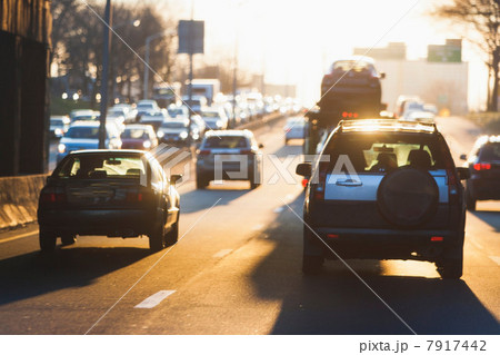 Traffic on sunlit highway Traffic on sunlit highway 7917442