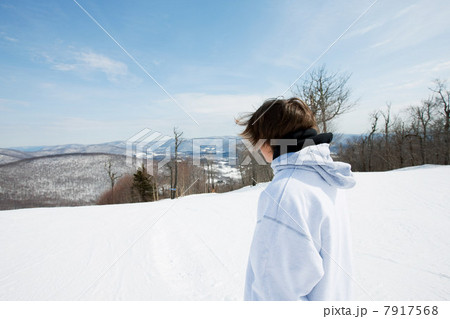 Young man wearing hooded top looking away 7917568