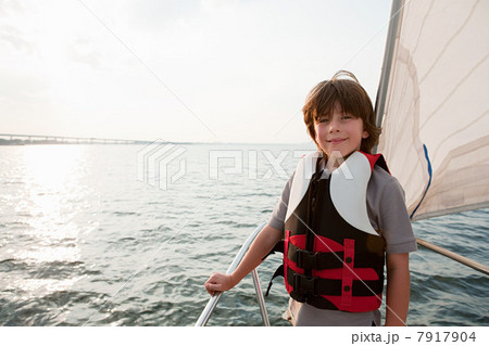 Young boy on board yacht Young boy on board yacht 7917904