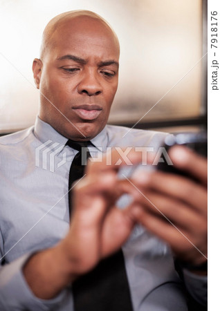 Mature man using cell phone 7918176
