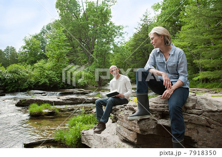 Mature couple outdoors in rural scene Mature couple outdoors in rural scene 7918350