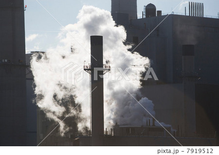 Steam from factory smokestack Steam from factory smokestack 7919512