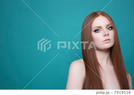 Portrait of woman with long red hair Portrait of woman with long red hair 7919518