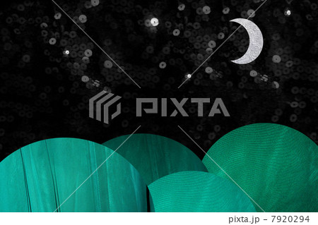 Green coloured hills at night with moon 7920294