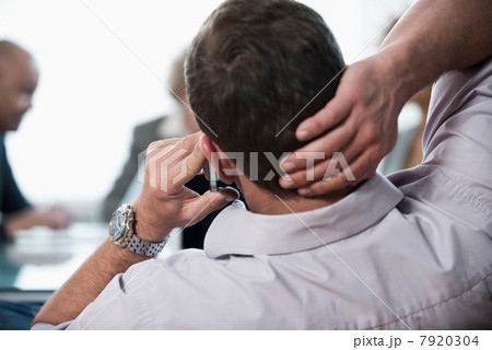 Businessman talking on cell phone Businessman talking on cell phone 7920304