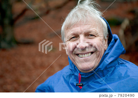 Senior man wearing waterproof clothing and smiling 7920490