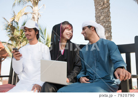 Middle Eastern people using laptop Middle Eastern people using laptop 7920790