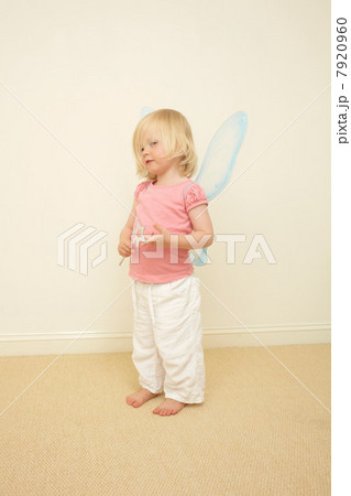 Toddler wearing wings, holding wand Toddler wearing wings, holding wand 7920960