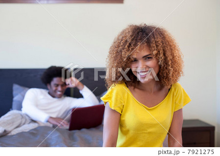 Mid adult woman in bedroom, portrait Mid adult woman in bedroom, portrait 7921275