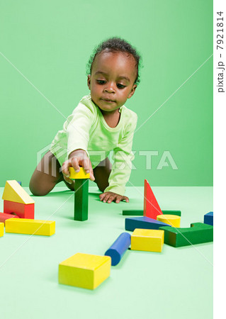 Baby boy playing with building blocks Baby boy playing with building blocks 7921814