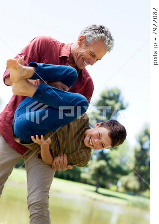 Grandfather and grandson playing Grandfather and grandson playing 7922082