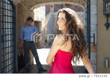 Smiling woman walking outdoors 7922150