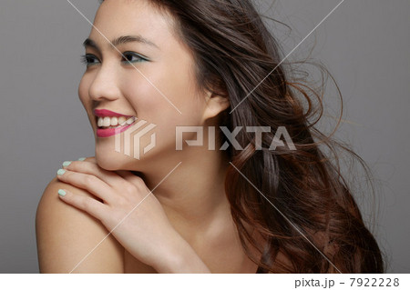 Young woman smiling in studio Young woman smiling in studio 7922228