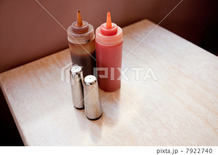 Condiments on cafe table Condiments on cafe table 7922740