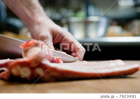 Butcher preparing pork ribs 7923491