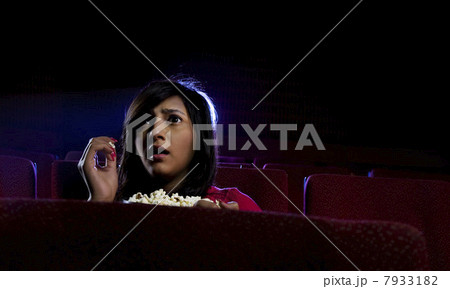 Girl watching a movie 7933182