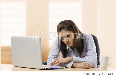 Businesswoman feeling lazy at work Businesswoman feeling lazy at work 7933384