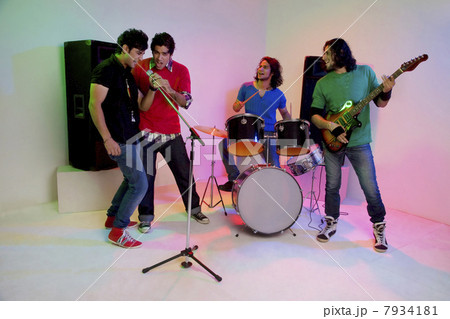Boys of a rock band enjoying themselves Boys of a rock band enjoying themselves 7934181