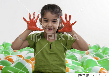 Girl with hands painted red Girl with hands painted red 7934905